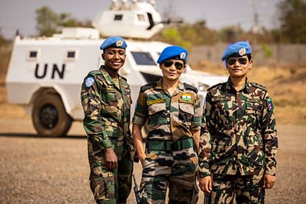 Captain Atupele Mbewe from Malawi (CL), SO CIMIC in Force HQ, Major Bindeshwari from India, SO MovCon (C), Captain Ritu Pandey from Nepal (R), Liaison Officer, Nepal Battalion 2 FRB, during a photo session with female peacekeepers serving UNMISS, United Nations Mission in South Sudan, held at United Nations camp, UN House, for the commemoration International Women's Day, Juba, South Sudan, 26 February 2021.